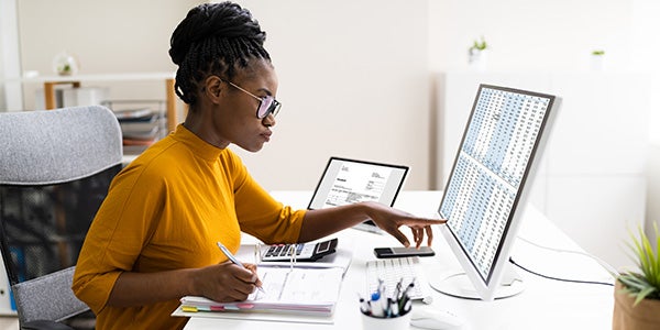 Small business owner viewing financial accounts