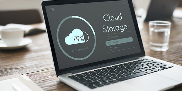 laptop uploading info to cloud storage